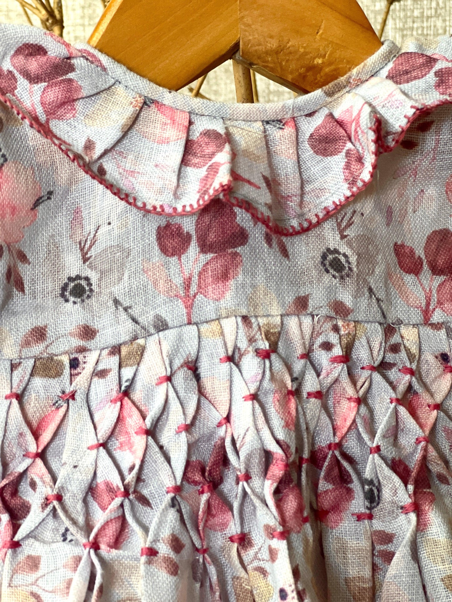 Lilac floral cotton linen smocked dress for girls with a ruffled collar, puffed sleeves, and a delicate vintage-style floral print—perfect for special occasions and everyday charm.