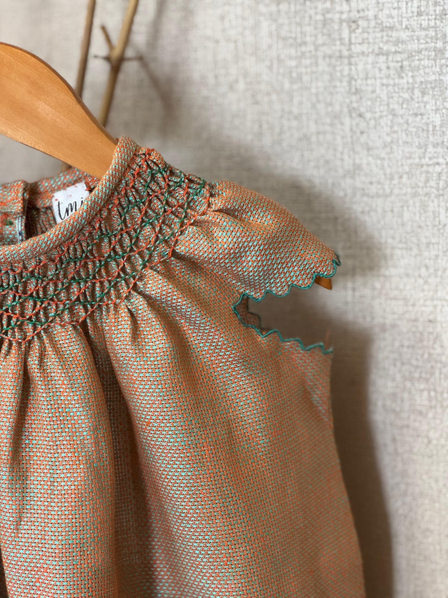 Linen Hand-Smocked Dress for girls – Orange & Teal Thread Weave